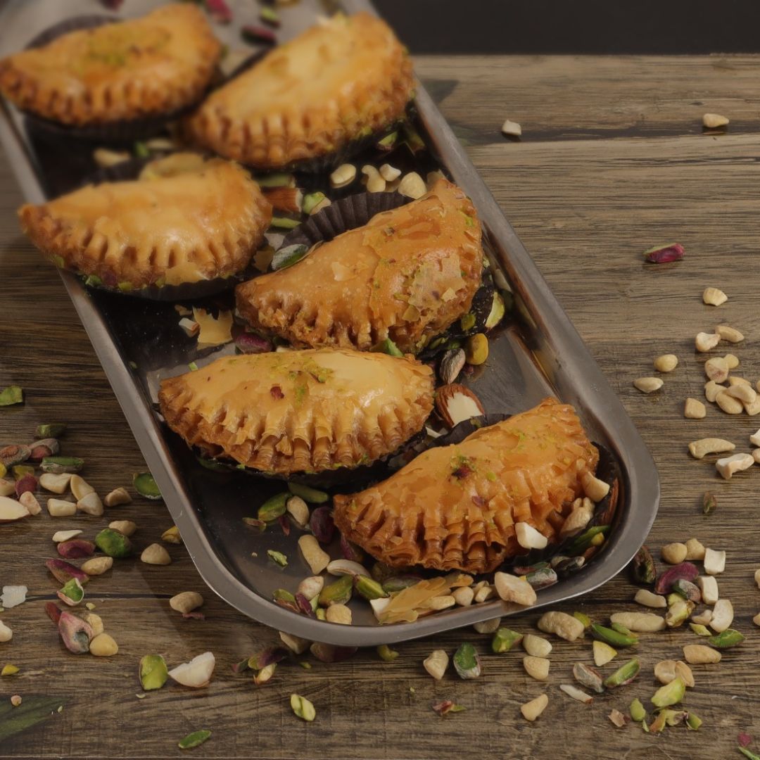 Baked dryfruit gujiya